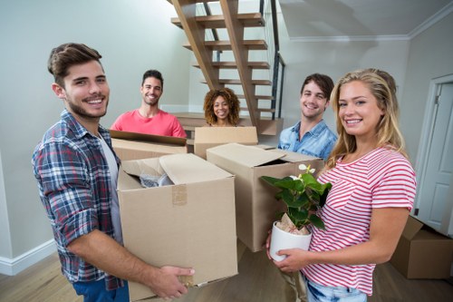 Chelsea removals team preparing a careful home relocation in a London street