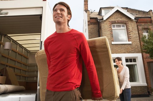 Professional office relocation team handling business furniture in Chelsea