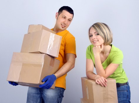 Wrapped household furniture ready for transport during a Chelsea move