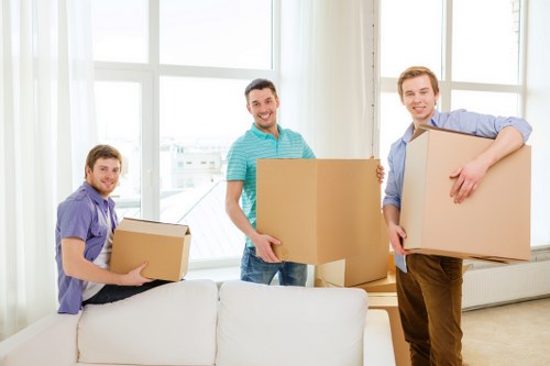 Furniture being handled during a professional Chelsea removals service