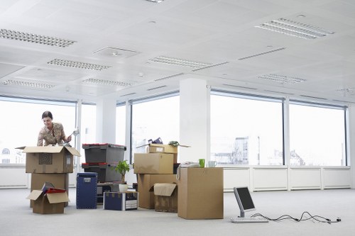 Professional team collecting office furniture in Chelsea