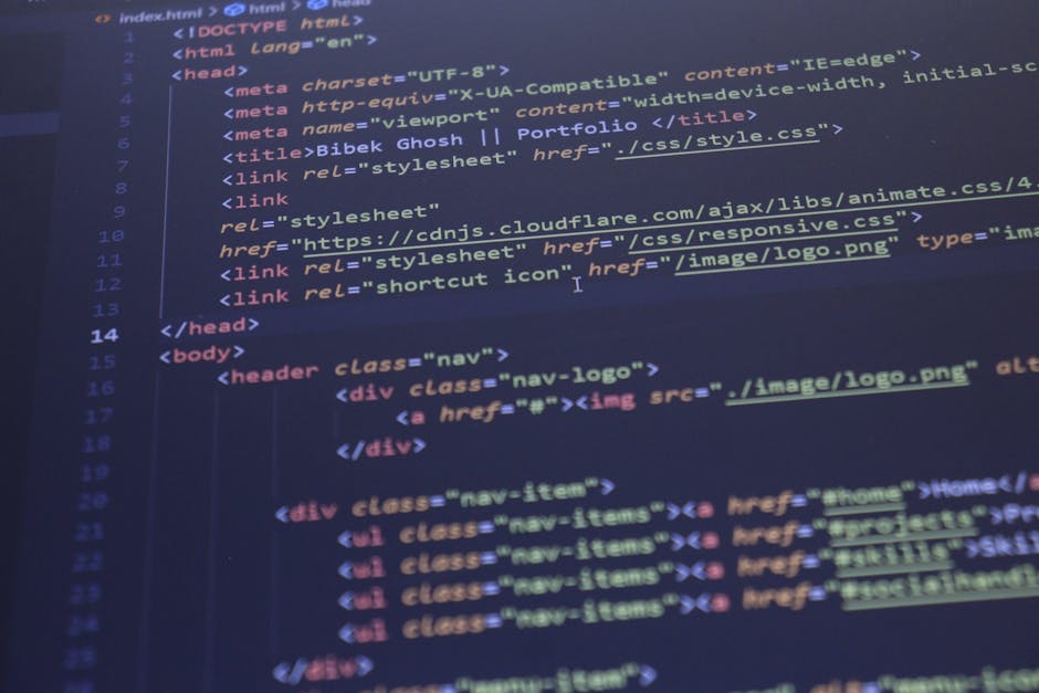 A computer screen displaying a code editor with an HTML document open, showing lines of code including doctype declaration, head elements, meta tags, and links to stylesheet and favicon files. The scr